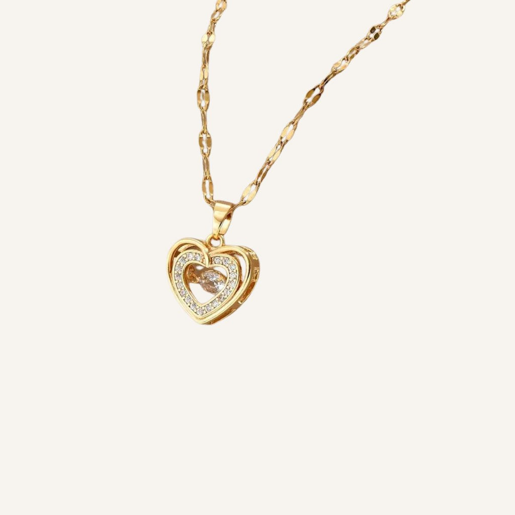 Collar Corazón · Collar con doble corazón y brillo sutil