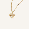 Collar Corazón · Collar con doble corazón y brillo sutil
