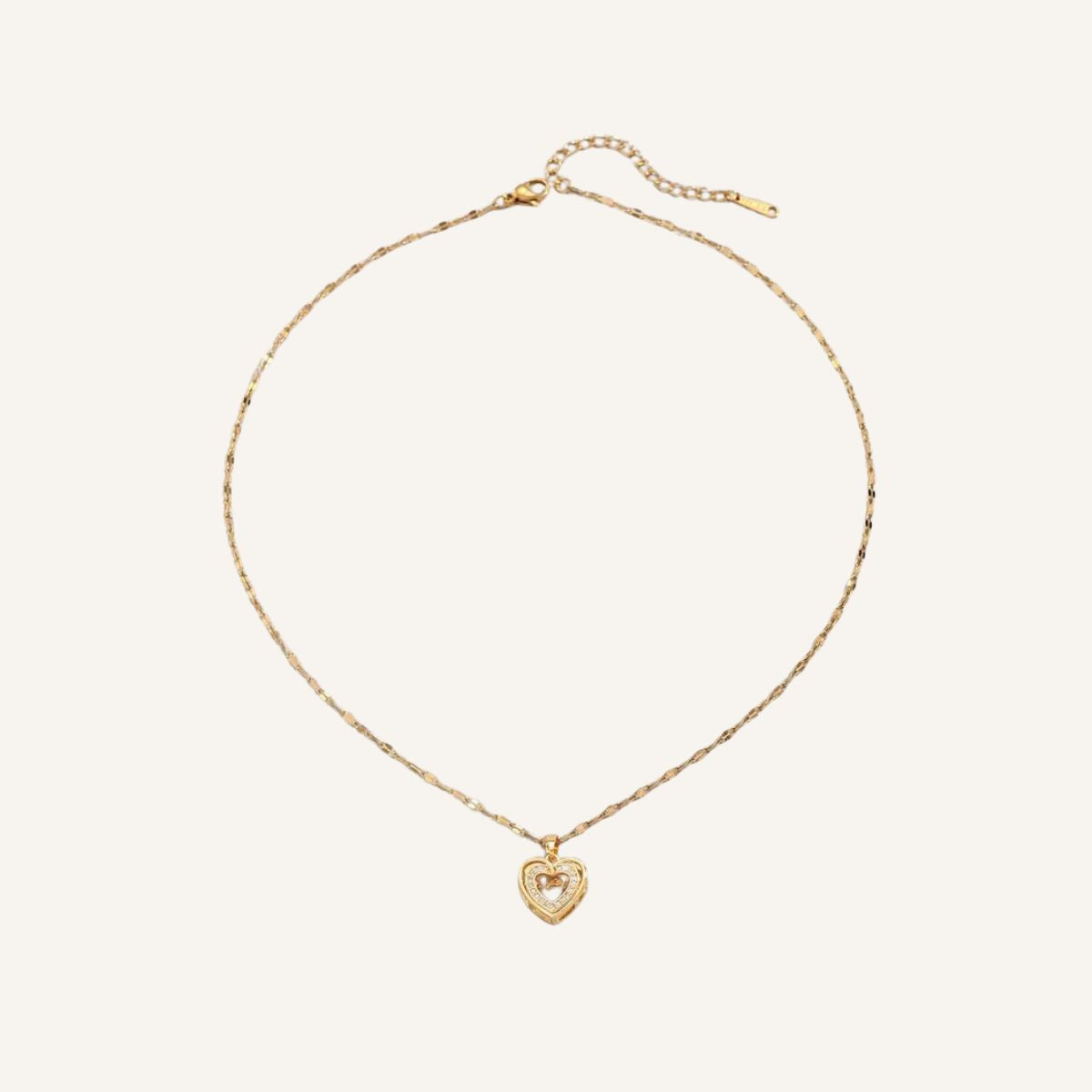 Collar Corazón · Collar con doble corazón y brillo sutil