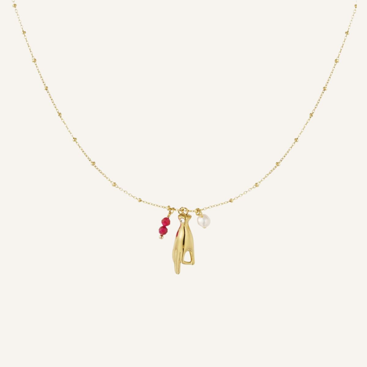 Mantra · Collar con mano protectora y perla