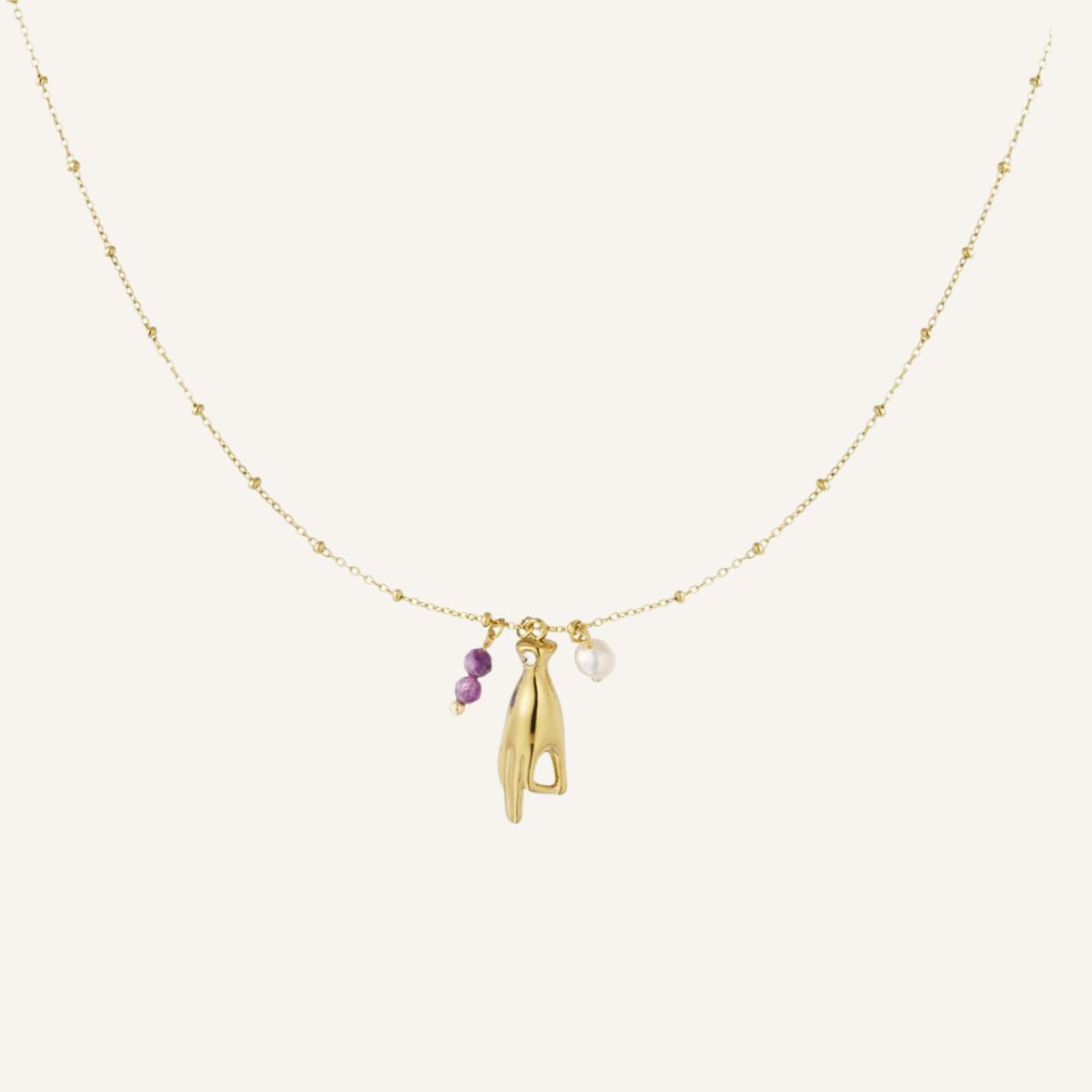 Mantra · Collar con mano protectora y perla