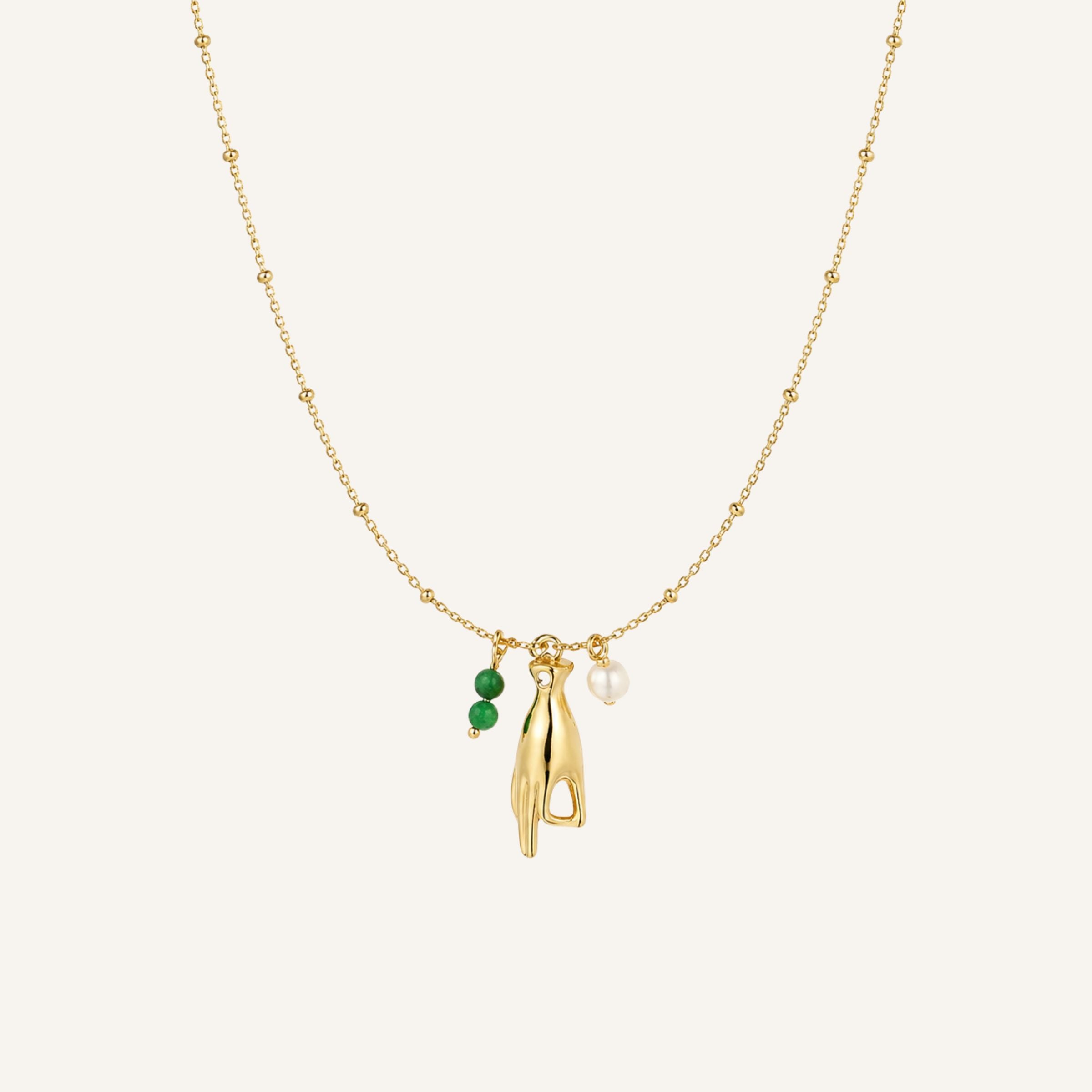 Mantra · Collar con mano protectora y perla